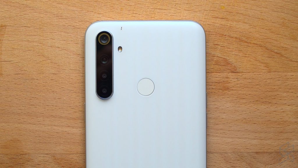A picture containing building, sitting, table, white

Description automatically generated
